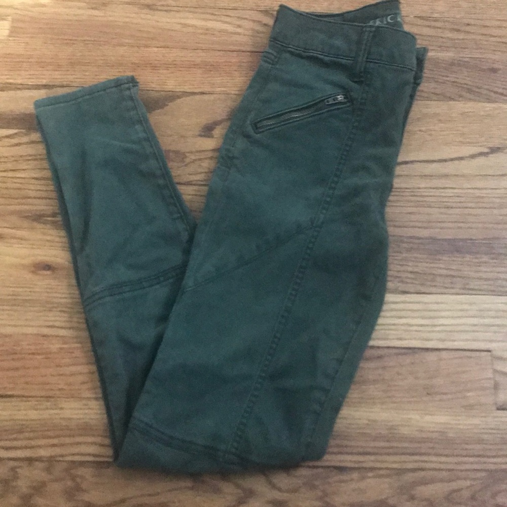 Green pants with zippers